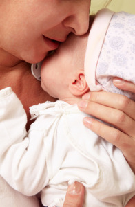 Mom singing to baby